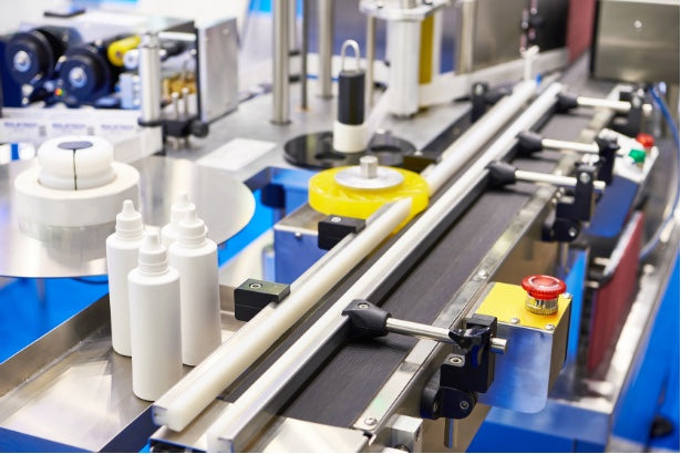 Automated labeling equipment on a packaging line